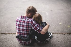 Father hugging daughter. "Perfect love expels all fear." 1 John 4:18