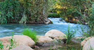 During the rainy season, the Jordan River's current is very deep and swift.